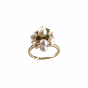 13 pearls set along with Emeralds in yellow gold ring