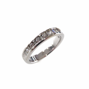 14kt White gold channel anniversary band with baguettes and round diamonds