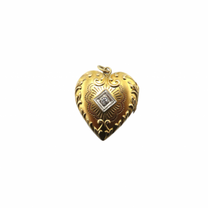 Vintage Heart shape Locket in 10kt Yellow gold with diamond in the center
