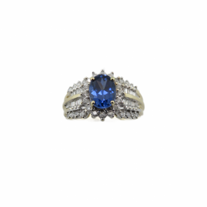 Blue Oval Sapphire and Diamond ring in Two tone gold
