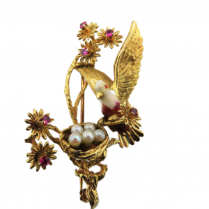 Vintage 18kt Bird and nest with a spray of Rubies brooch