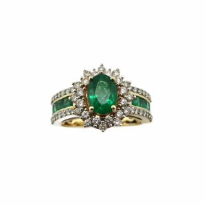 Oval Emerald with double halo of diamonds in 14kt Yellow Gold